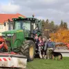 Family members of Divorne Farms pictured with their KUHN FC Triple Mower Conditioner.