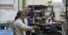 Jerry Smith discusses operations at the Vernon, New York, Regional Distribution Center with Representative Brindisi.