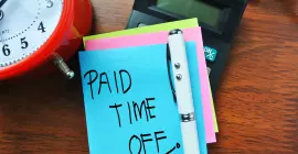 Sticky note with paid time off