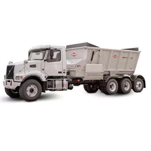 A SL 124 with a lid on the manure spreader.