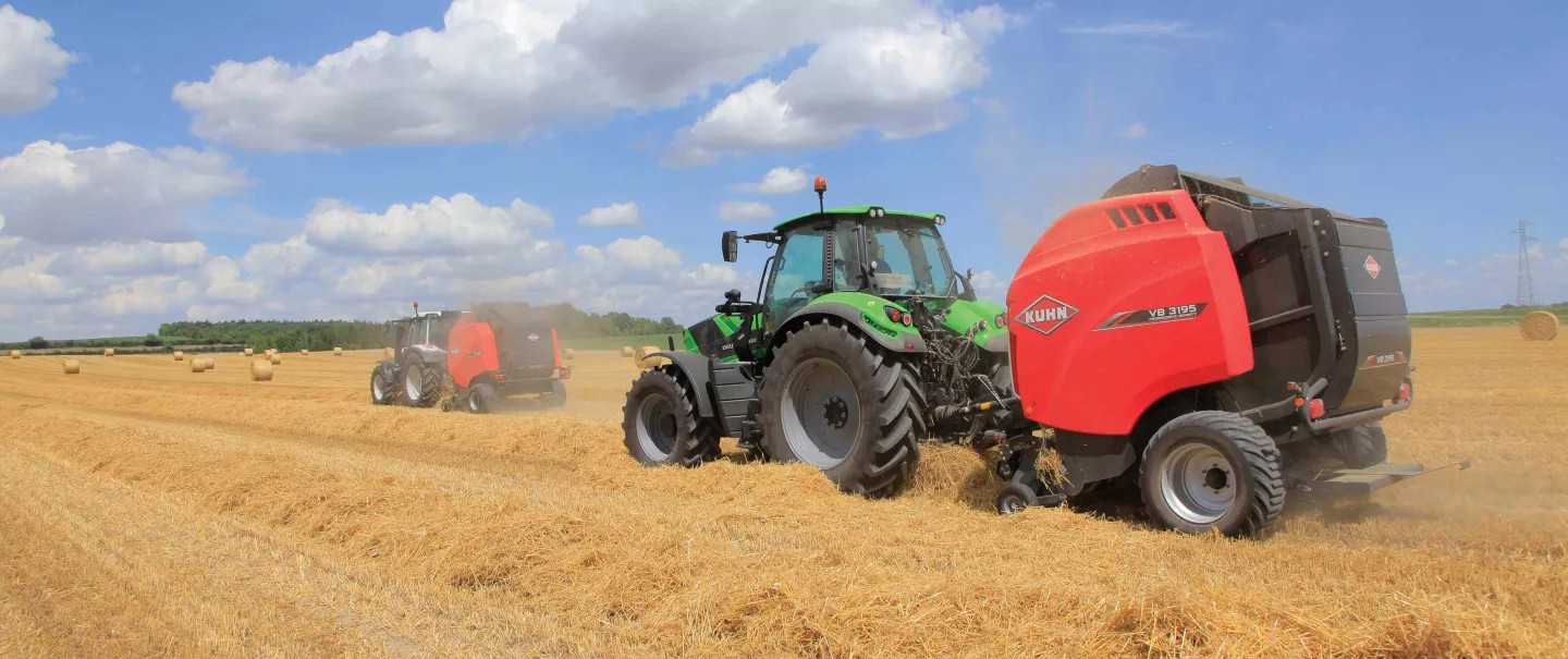 Two VB 3195 balers baling straw in the field.