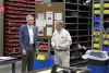 Representative Brindisi walks the warehouse with Jerry Smith.