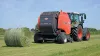 A VB 3165 round baler with a freshly ejected bale behind it