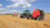 A VB 3195 following another VB 3195 in the field baling straw