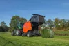 A view of a VB 3160 ejecting a bale from behind the machine